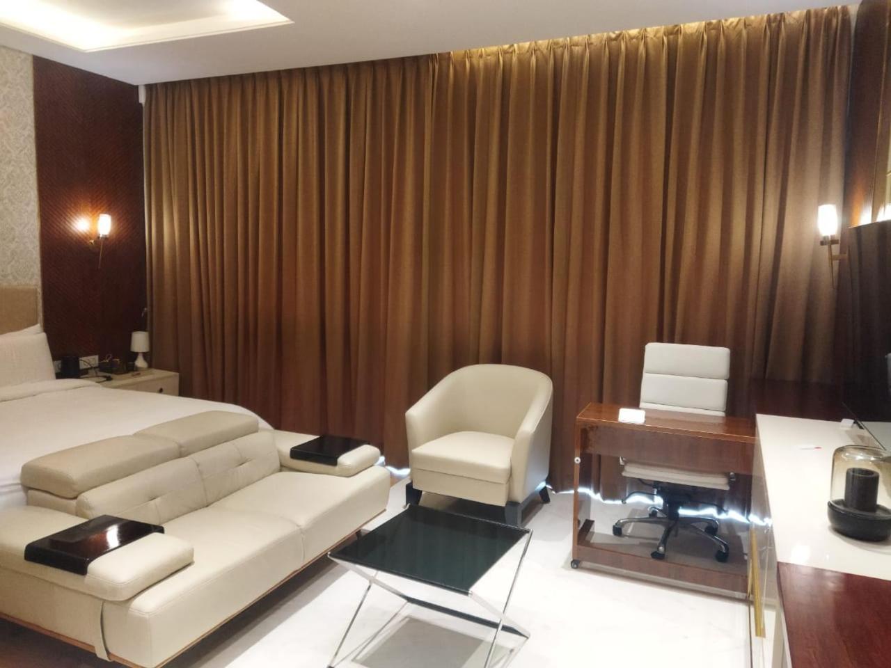 At Leela Residencies.