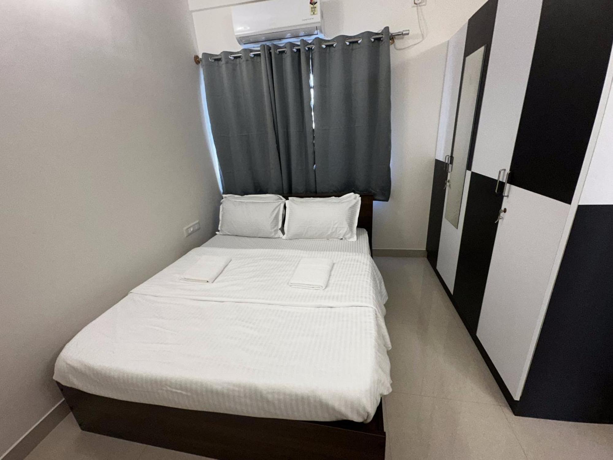 Trinetra Homes 102 Hotel Bangalore