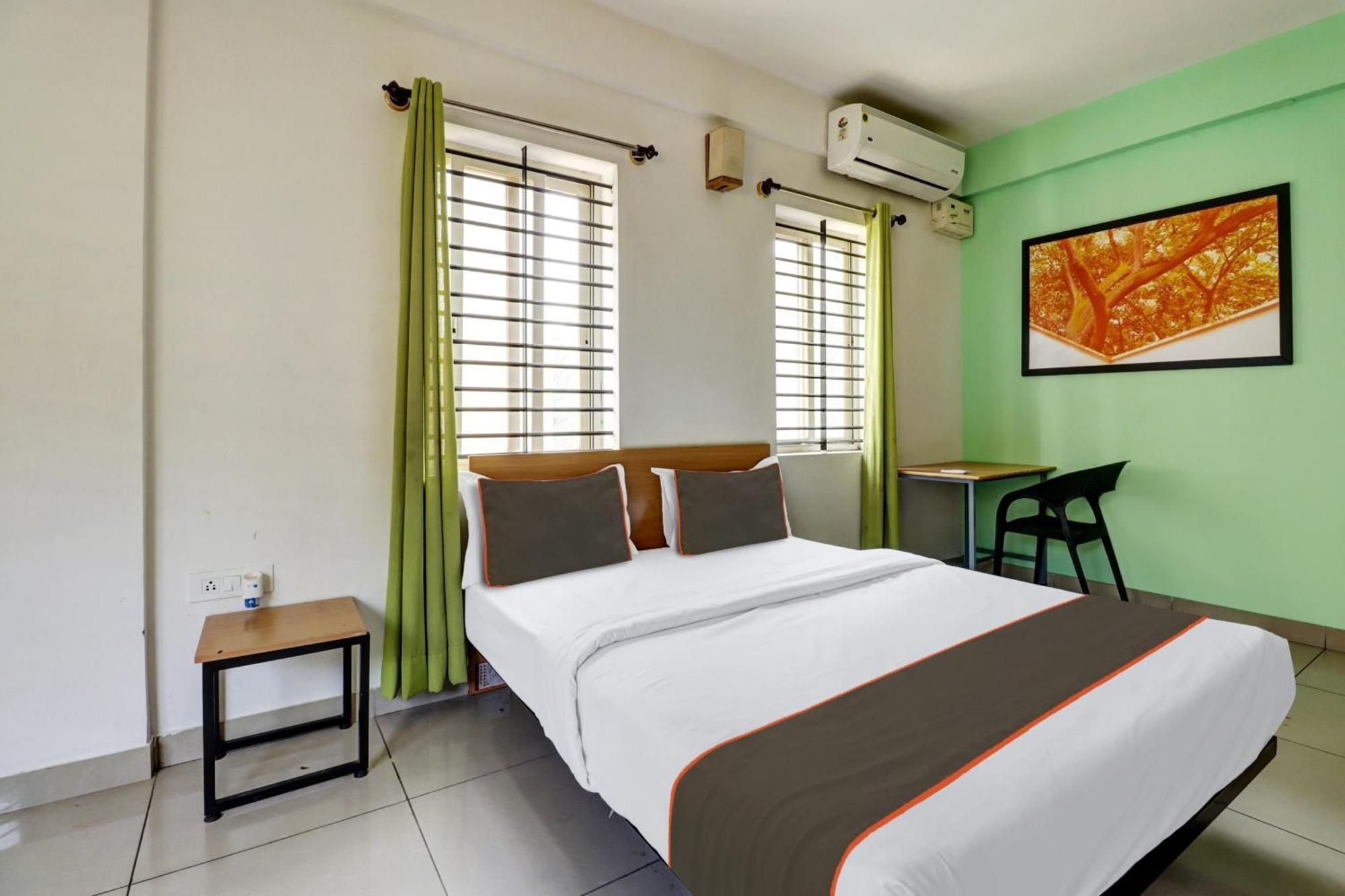 Hotel Collection O S M Bangalore