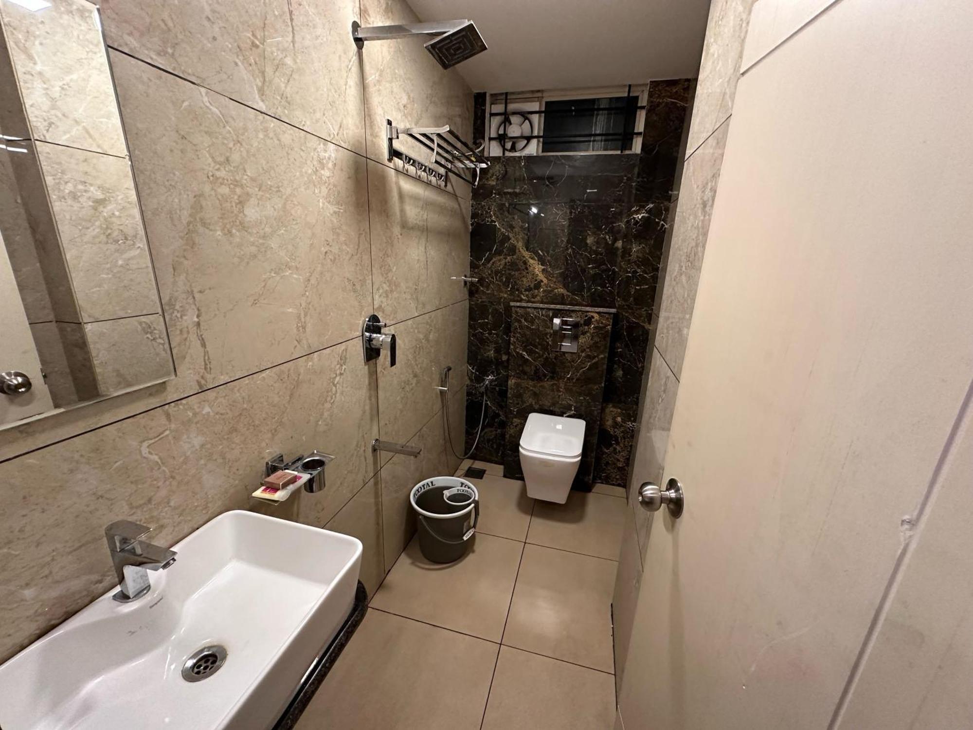 Hotel Super Collection O Local Square | Whitefield Bangalore