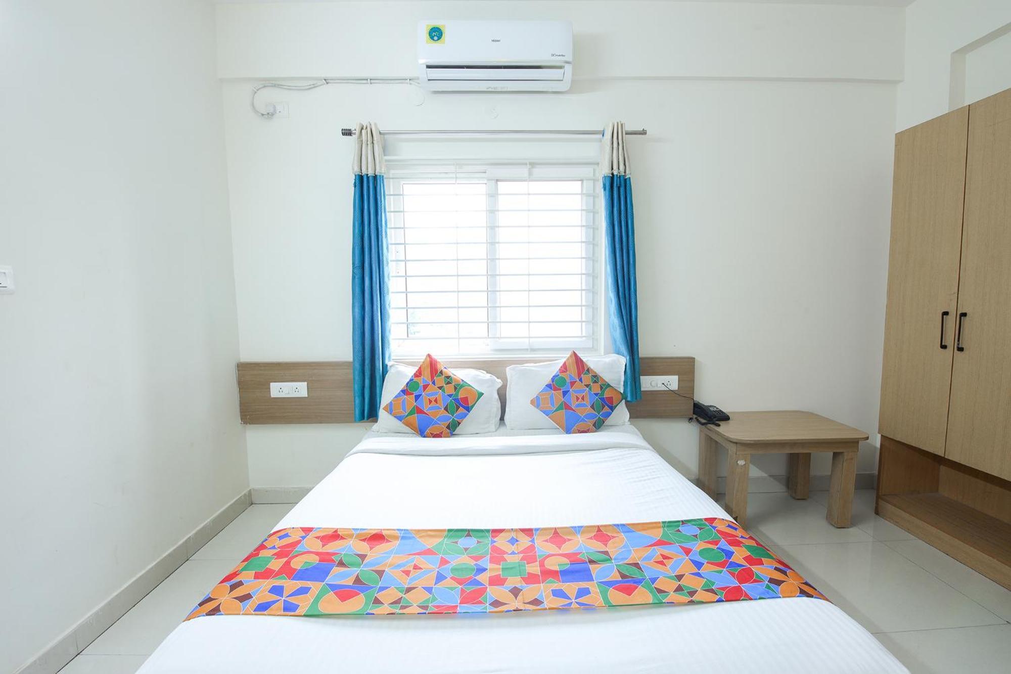 Fabhotel Golden Grand - Global Village Hotel