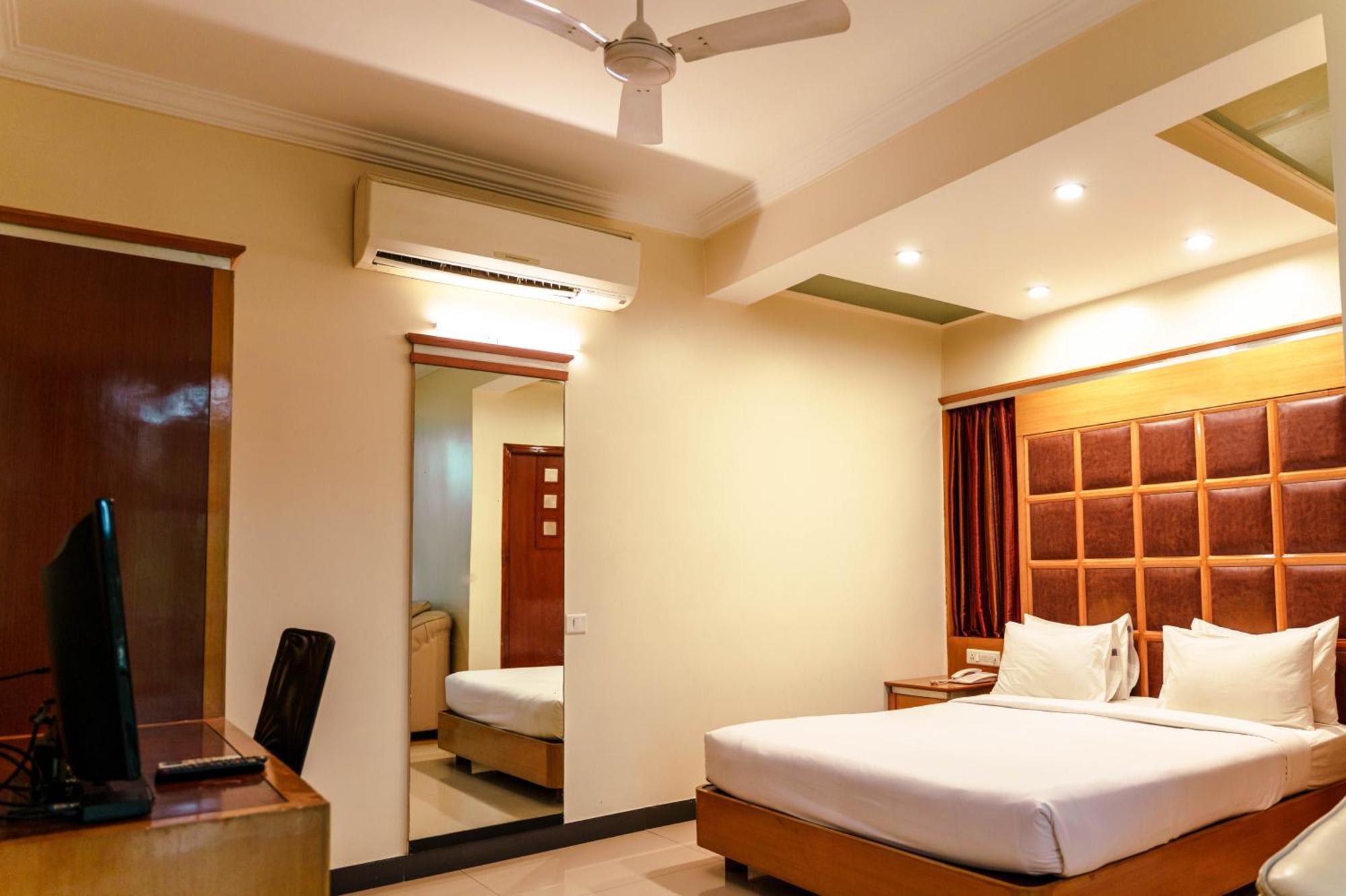 Bisque Magaji Orchid - Near Majestic Railway Station