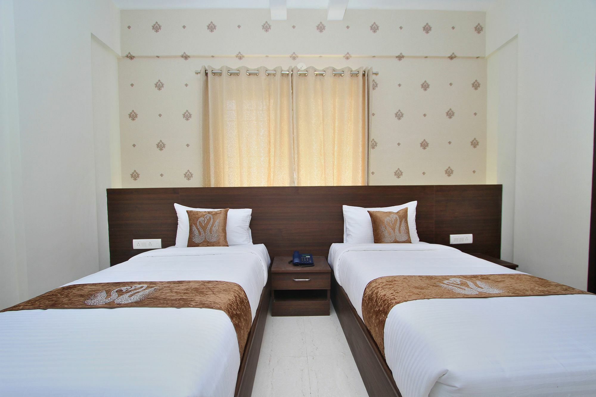 Capital O 9917 Sjr And Comforts Hotel Bangalore