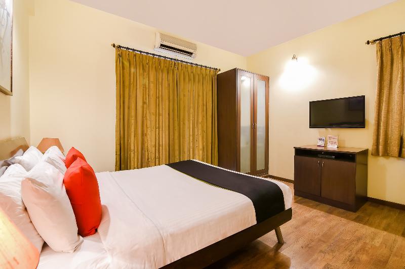 Capital O 37879 Orchard Greens Hotel