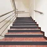 Fabhotel Dhanvitha Suites