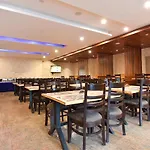 Fabhotel Dhanvitha Suites